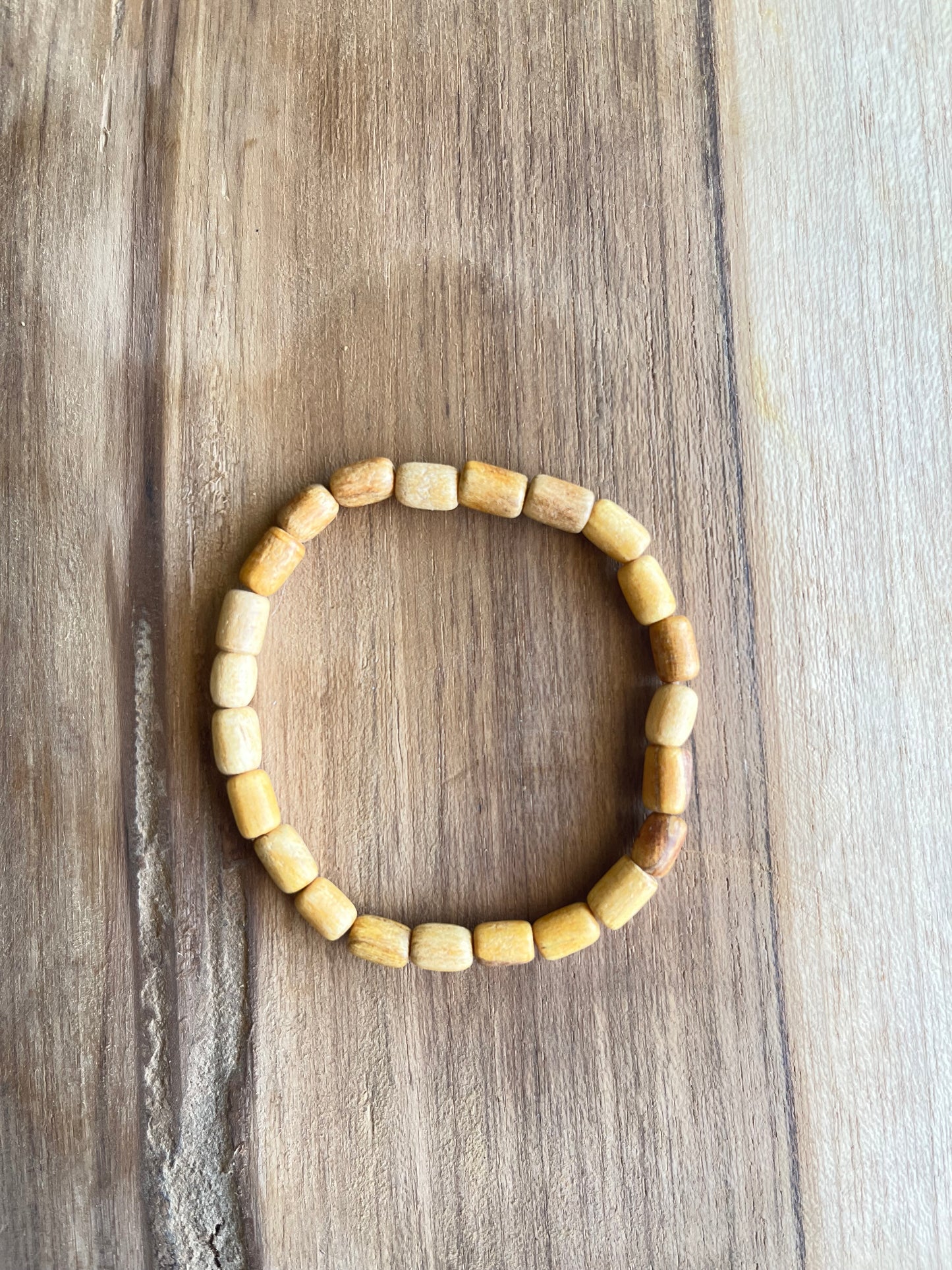 Bracelet Palo-Santo perles cylindriques 14eur