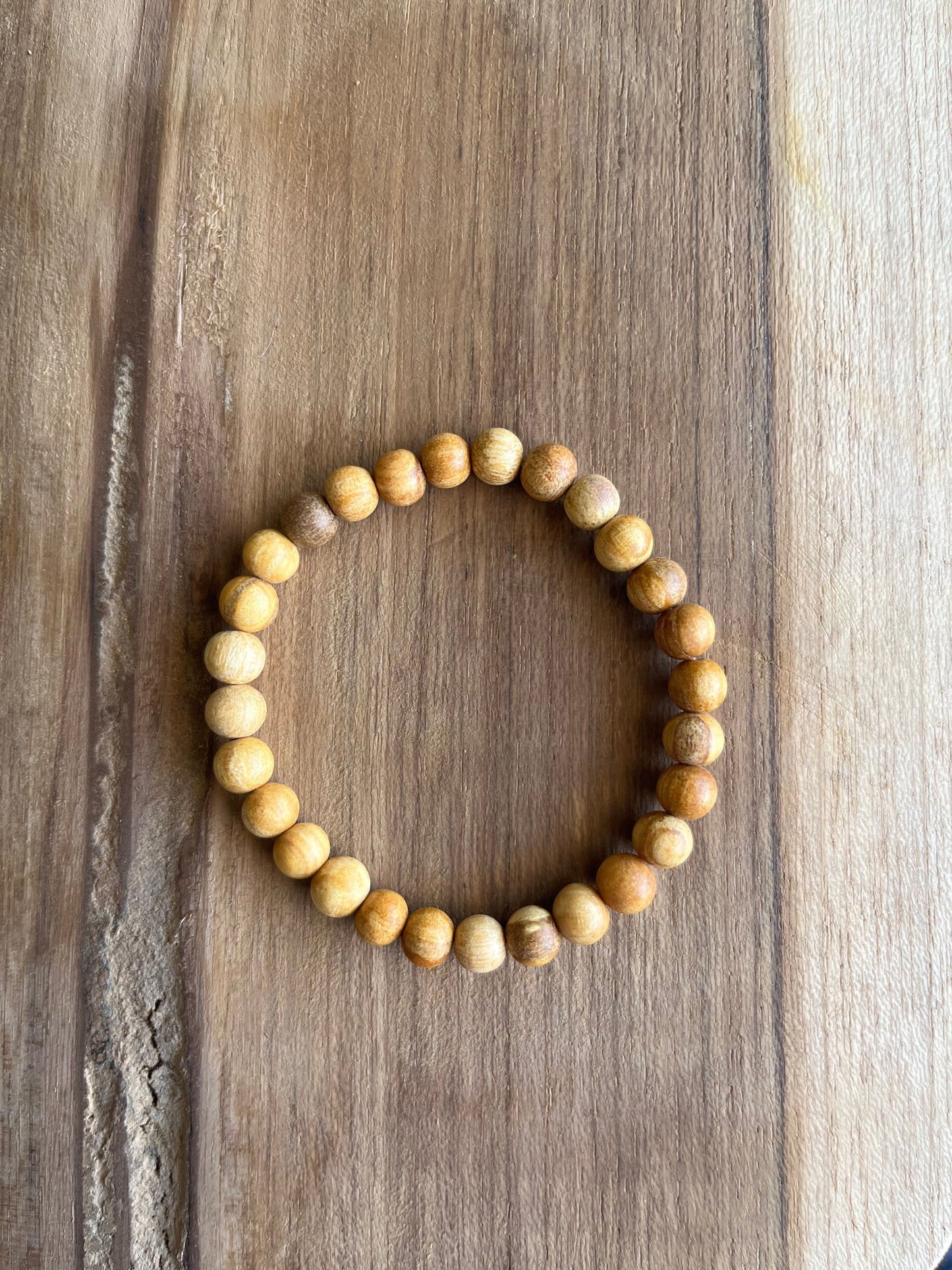 Bracelet Palo-Santo perles rondes 16eur